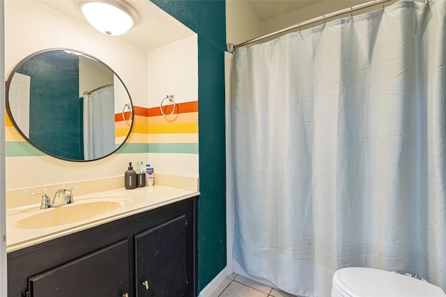 full bathroom featuring vanity, toilet, and tile patterned flooring