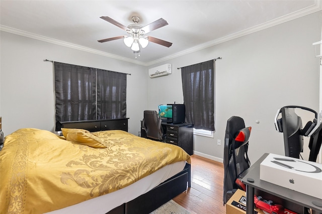 bedroom with baseboards, a wall unit AC, wood finished floors, and crown molding