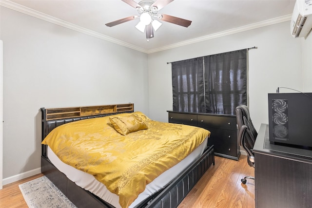 bedroom with crown molding, light wood-style floors, and an AC wall unit