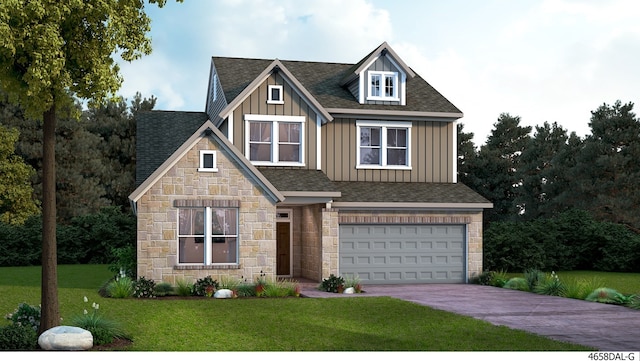 view of front of house with a front lawn and a garage