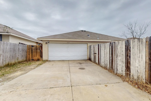 detached garage with fence