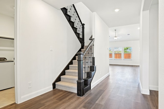 2321 Wellington Ln, Corinth, TX 76210 - stairs with washer / clothes dryer, ceiling fan, wood finished floors, baseboards, and recessed lighting
