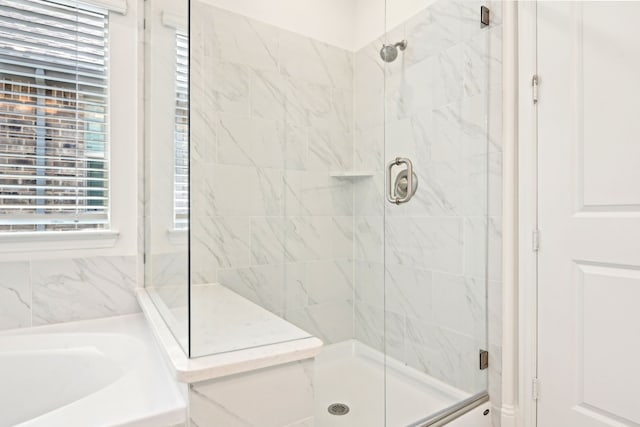2321 Wellington Ln, Corinth, TX 76210 - full bathroom with a stall shower and a garden tub