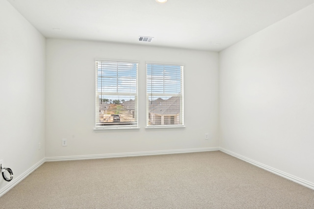 2321 Wellington Ln, Corinth, TX 76210 - unfurnished room featuring carpet floors and baseboards