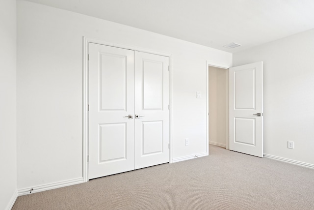 2321 Wellington Ln, Corinth, TX 76210 - unfurnished bedroom with carpet, baseboards, and a closet