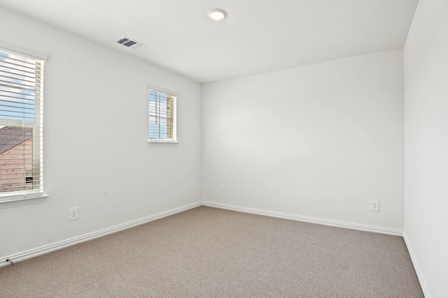 2321 Wellington Ln, Corinth, TX 76210 - empty room with carpet flooring and baseboards
