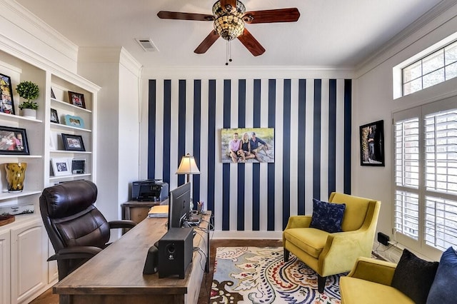 office space featuring ceiling fan and crown molding