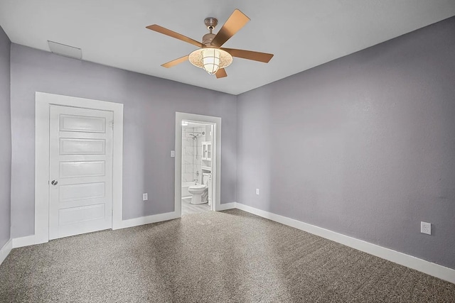 unfurnished bedroom featuring ensuite bathroom, ceiling fan, and carpet flooring