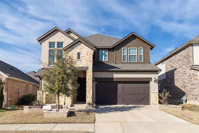 view of front of property with a garage