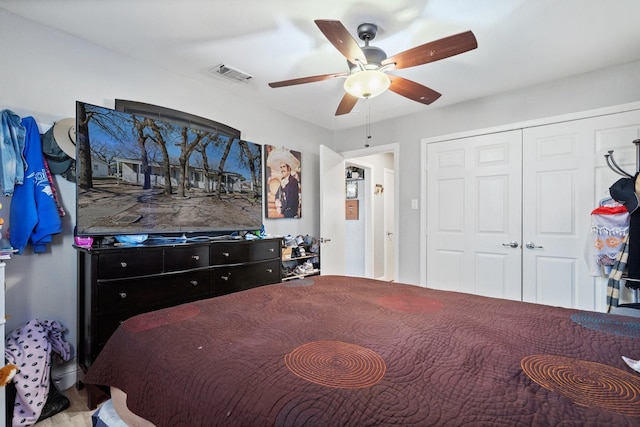 bedroom featuring a closet and ceiling fan