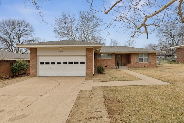 ranch-style home featuring a front yard and a garage