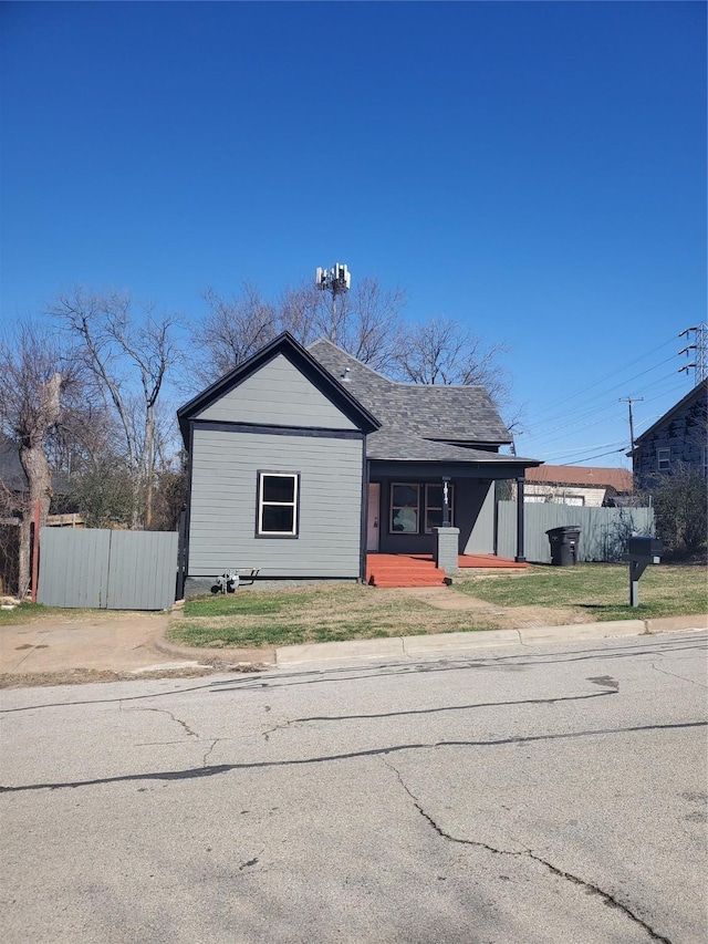 view of front of home with fence