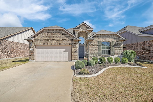 view of front of home featuring a garage, brick siding, concrete driveway, roof with shingles, and a front lawn