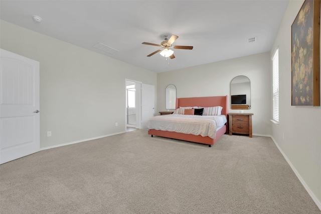 bedroom with a ceiling fan, visible vents, baseboards, and carpet flooring