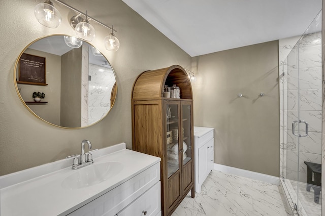 bathroom with vanity and a shower with door