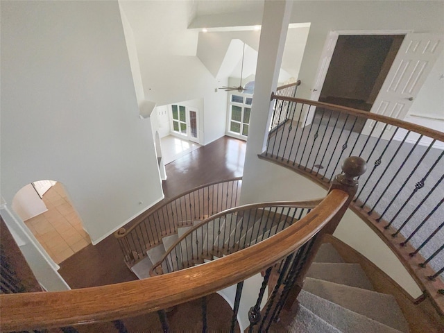 stairway with ceiling fan