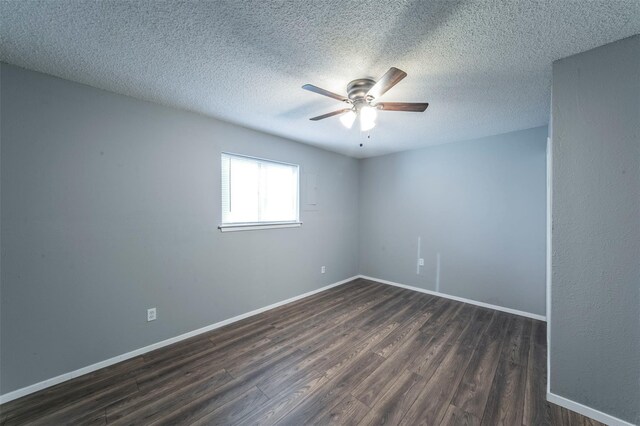 spare room featuring ceiling fan, a textured ceiling, and dark hardwood / wood-style flooring