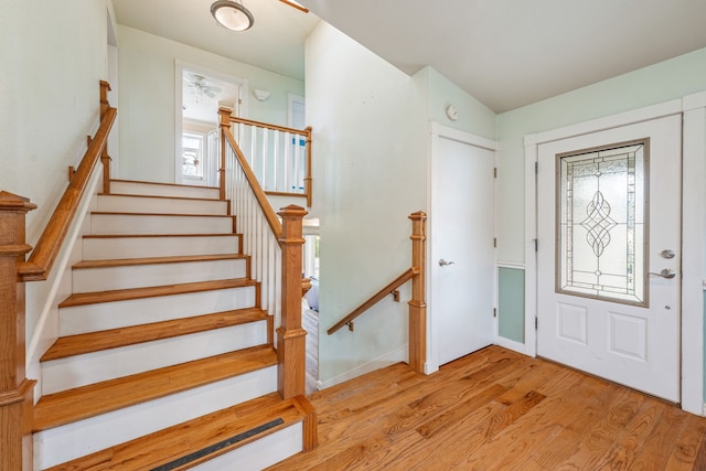 foyer with light hardwood / wood-style floors and a wealth of natural light