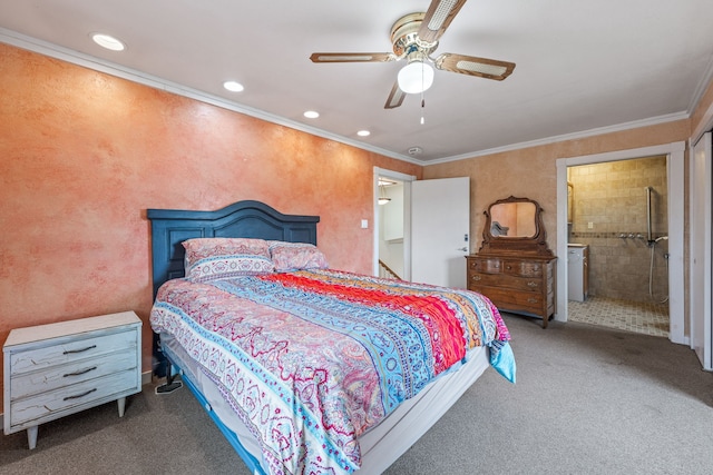 bedroom featuring ensuite bathroom, dark carpet, crown molding, and ceiling fan