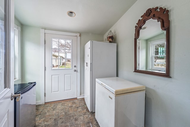 entryway featuring plenty of natural light