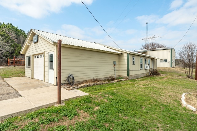 view of home's exterior with a yard and cooling unit