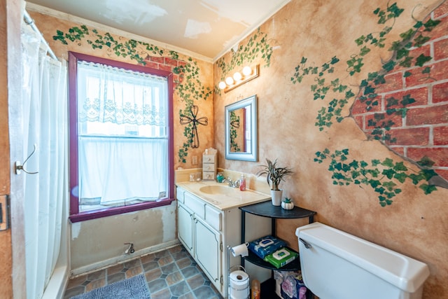 bathroom with a shower with shower curtain, vanity, crown molding, and toilet