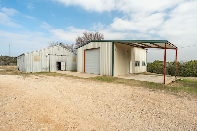 view of outbuilding featuring a garage