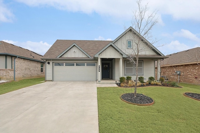 view of front of house featuring an attached garage, driveway, board and batten siding, and a front yard