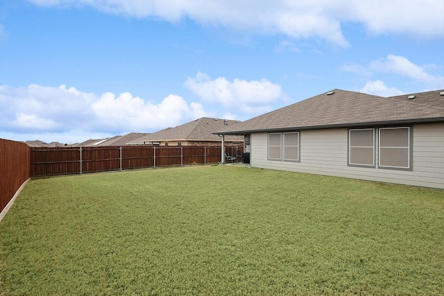 view of yard featuring a fenced backyard