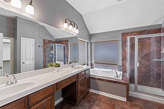 7621 Glenwood Springs Ln, Mckinney, TX 75070 - full bathroom with vaulted ceiling, a stall shower, a garden tub, and double vanity