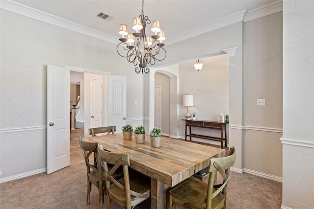 7621 Glenwood Springs Ln, Mckinney, TX 75070 - dining area featuring light carpet, crown molding, arched walkways, a chandelier, and baseboards