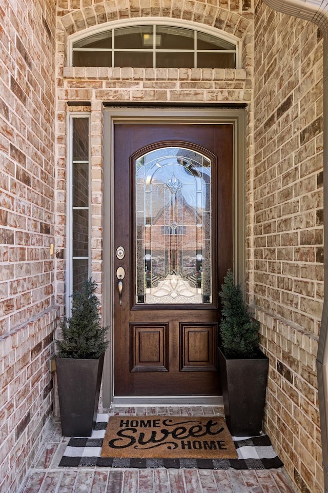 7621 Glenwood Springs Ln, Mckinney, TX 75070 - doorway to property featuring brick siding