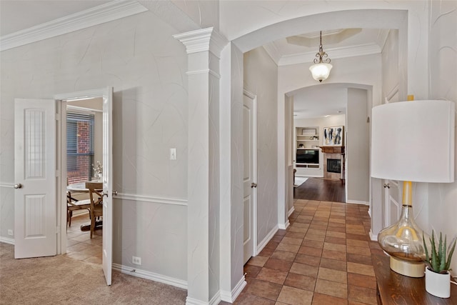 7621 Glenwood Springs Ln, Mckinney, TX 75070 - corridor featuring arched walkways, crown molding, and baseboards