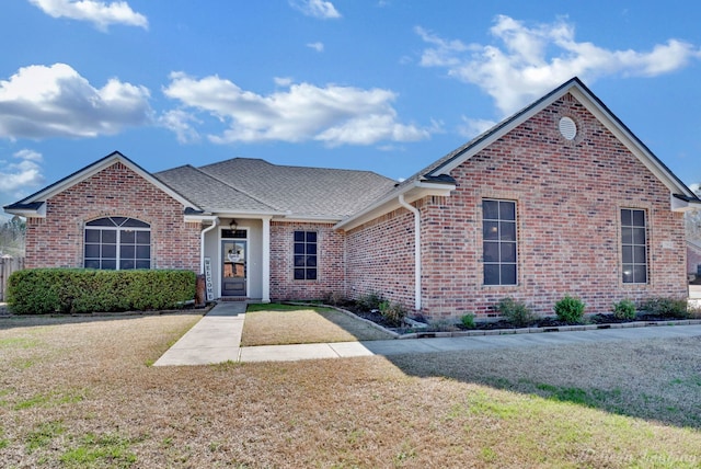 view of front of property with a front lawn