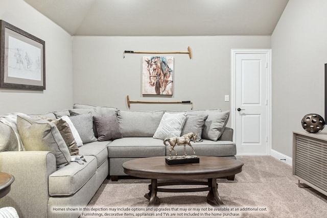 carpeted living room with lofted ceiling