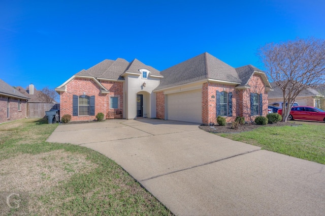 view of front facade featuring a front lawn and a garage