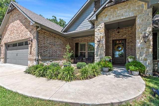 property entrance with a porch and a garage