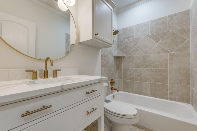 full bathroom featuring tiled shower / bath combo, toilet, vanity, and ornamental molding