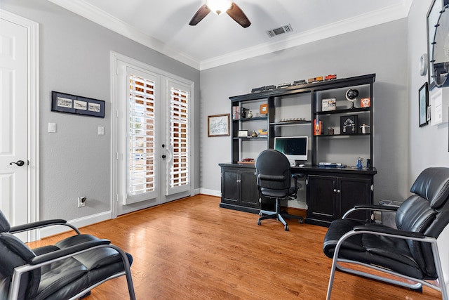 home office featuring ceiling fan, ornamental molding, light hardwood / wood-style floors, and french doors