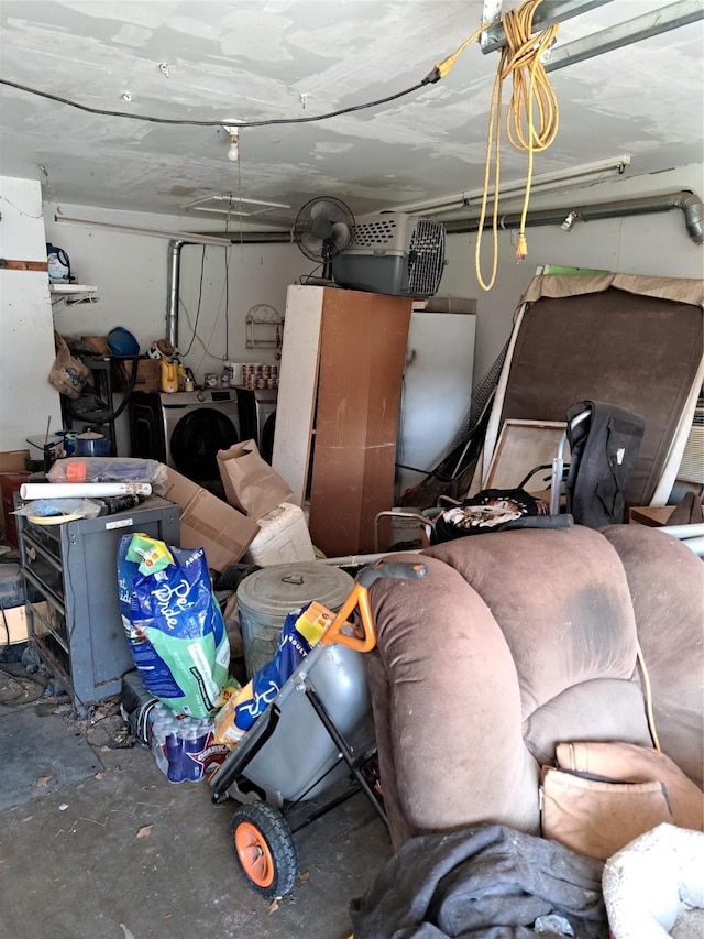 garage with washer and dryer