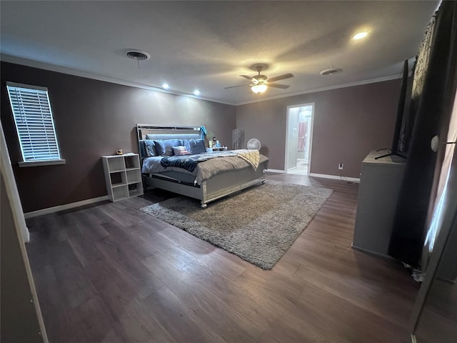 bedroom featuring dark hardwood / wood-style flooring, ornamental molding, connected bathroom, and ceiling fan