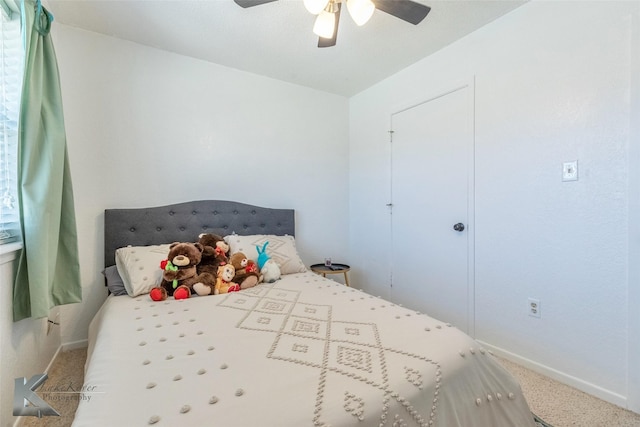 bedroom featuring carpet floors, ceiling fan, and baseboards