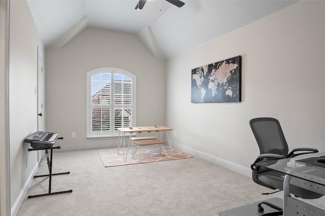 home office featuring a ceiling fan, lofted ceiling, light colored carpet, and baseboards