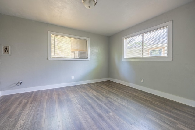 2816 S Grove St, Fort Worth, TX 76104 - empty room with dark hardwood / wood-style flooring