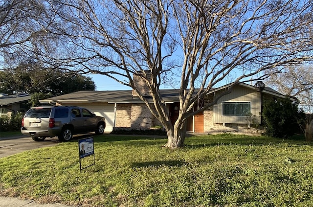 single story home with a front lawn and a garage