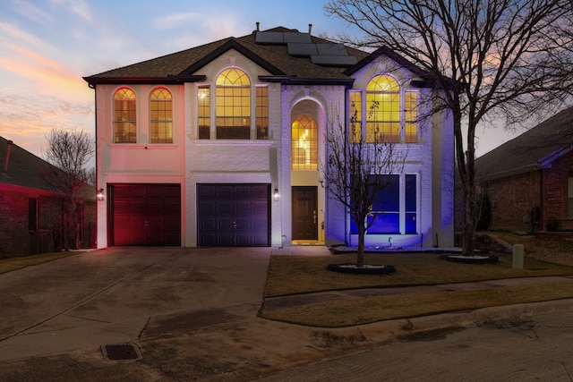 view of front of property featuring a garage