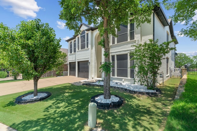 4104 Walnut Creek Ct, Fort Worth, TX 76137 - view of front of home with an attached garage, concrete driveway, and stucco siding