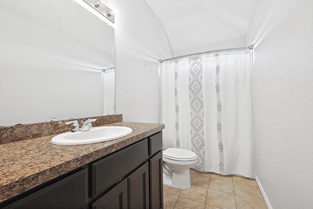 bathroom with toilet, lofted ceiling, tile patterned flooring, and vanity