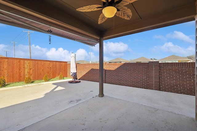 view of patio featuring ceiling fan