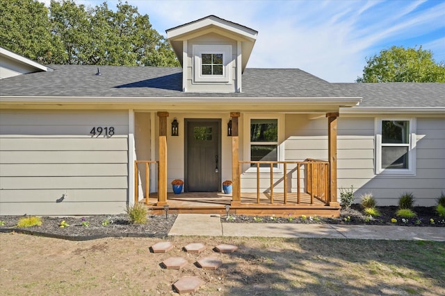 property entrance with covered porch